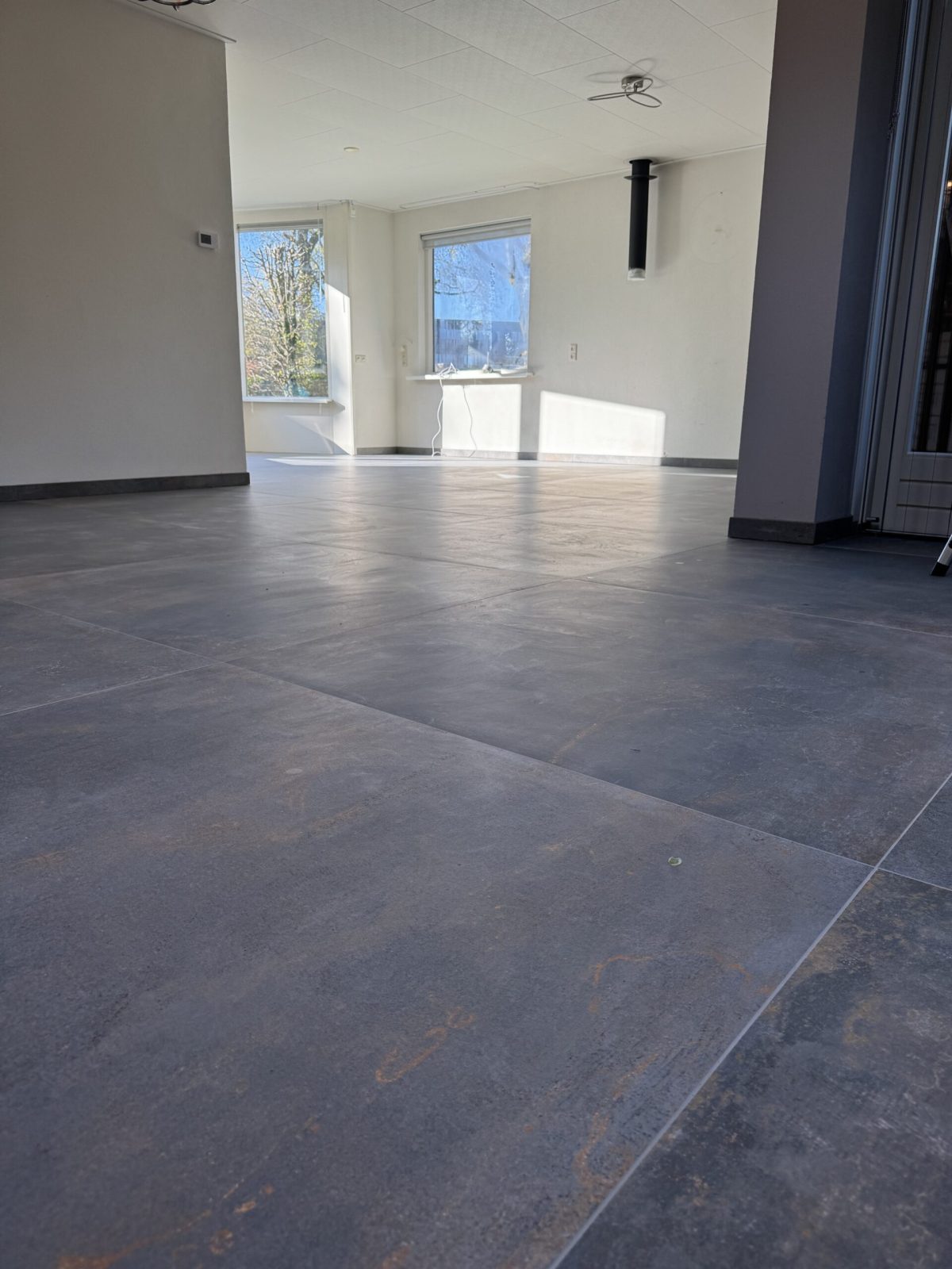 tegelvloer woonkamer plavuizen Bosmans Afbouw bv Emmeloord